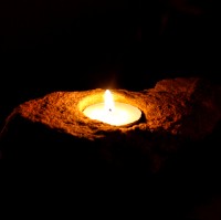 The first candle holder