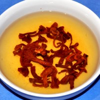 Rehydrate the dried mushrooms