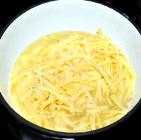 Add the cheese and wine